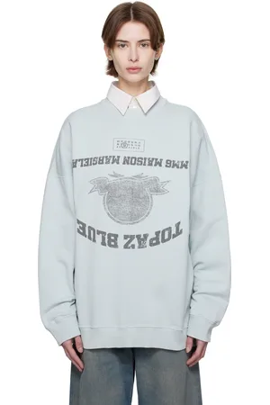 Maison Margiela Pull molletonné bleu à imprimés