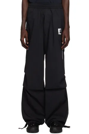 Rhude Pantalon de survêtement noir en tissu à parachute à passepoils