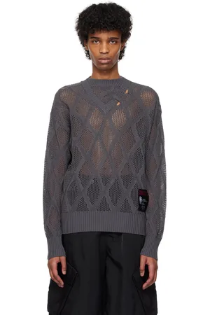 NULLUS Pull gris en tricot à mailles ouvertes à découpes