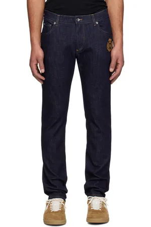 Dolce & Gabbana Jean ajusté bleu marine en denim extensible de coton à écusson