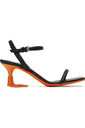 Moschino Sandales noires à talon en forme de patte de canard