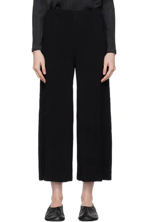Issey Miyake Pantalon noir à plissures Hatching