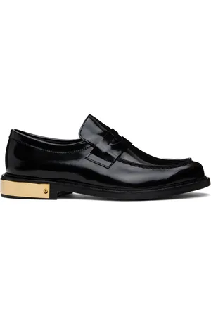 Moschino Flâneurs de style collégial noirs