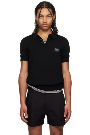 Dolce & Gabbana Polo noir en laine à plaque à logo - Essential