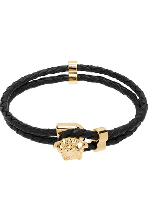 VERSACE Bracelet noir en cuir tressé à logo Medusa