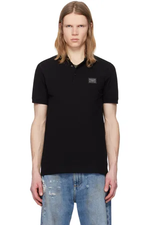 Dolce & Gabbana Polo noir en piqué de coton à plaque à logo - Essential