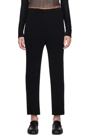 Issey Miyake Pantalon noir à plissures Hatching