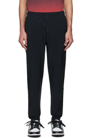 Nike Pantalon de survêtement de sport noir à logo