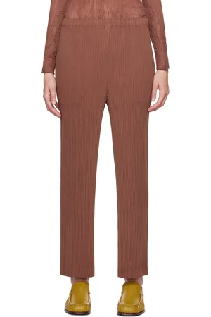 Issey Miyake Pantalon brun à plissures Hatching