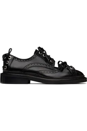Simone Rocha Brogues noires à laçages et à découpe
