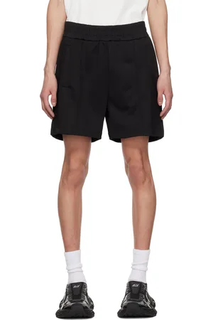 Palm Angels Short de survêtement noir à logo incurvé