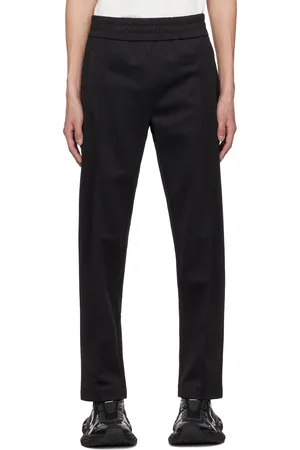 Palm Angels Pantalon de survêtement noir à logo incurvé