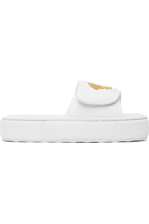 VERSACE Pantoufles blanches à motif à logos