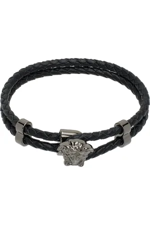 VERSACE Bracelet noir en cuir tressé à logo Medusa
