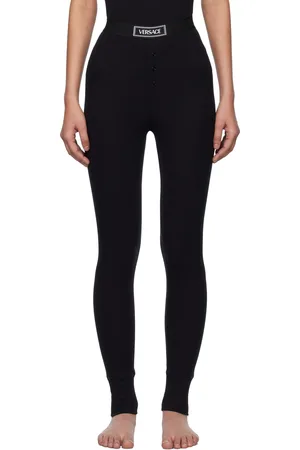VERSACE Legging noir en jersey côtelé à logo rétro 