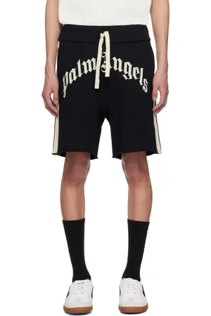 Palm Angels Short de survêtement noir à logo incurvé