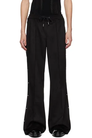 MISBHV Pantalon de survêtement noir en suède synthétique à ferrures d