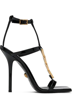 VERSACE Sandales à talon de 105 mm noires en cuir verni à chaine à logos V2025
