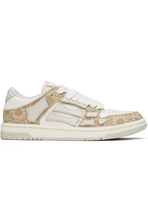 AMIRI Baskets basses blanc et beige à appliqués Skel Top et à quadrigrammes