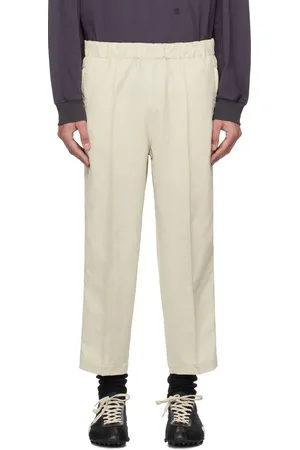 NANAMÍCA Pantalon beige à revers écourtés
