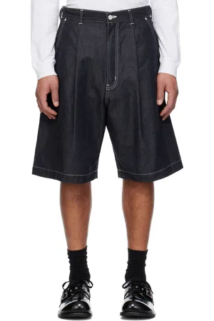 Comme des Garçons Short bleu marine en denim de coton et nylon