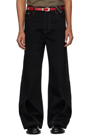 NULLUS Jean noir à ornement étagé aux jambes exclusif à SSENSE