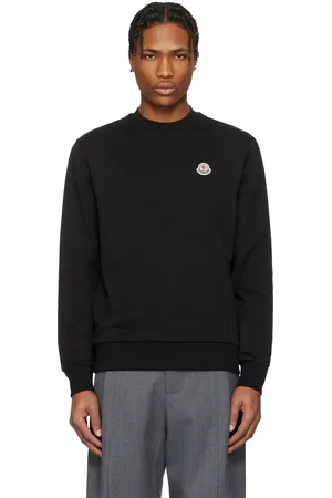 Moncler Pull molletonné noir en coton à écusson à logo