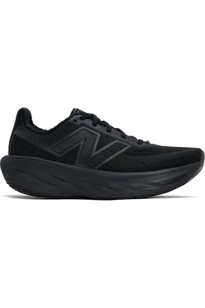 New Balance Baskets 1080v14 noires à semelle intercalaire en Fresh Foam X