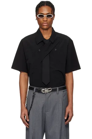 NULLUS Polo noir en tissu gaufré