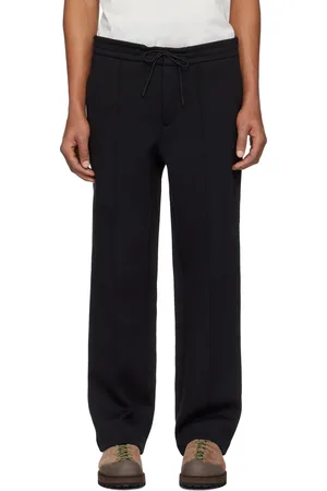 Moncler Pantalon de survêtement noir en coton et en néoprène à écusson à logo