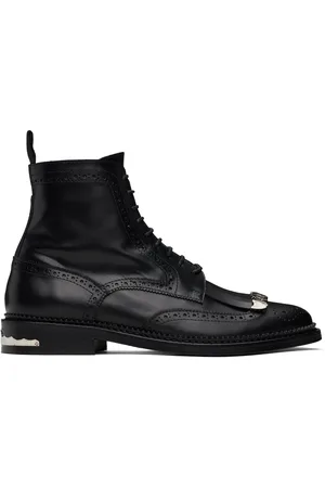 TOGA VIRILIS Bottes noires à patte écossaise exclusives à SSENSE