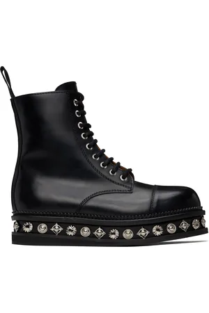 TOGA VIRILIS Bottes noires en cuir à plateforme
