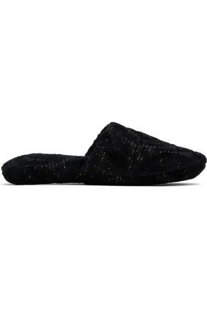 VERSACE Pantoufles noires à motif Barocco