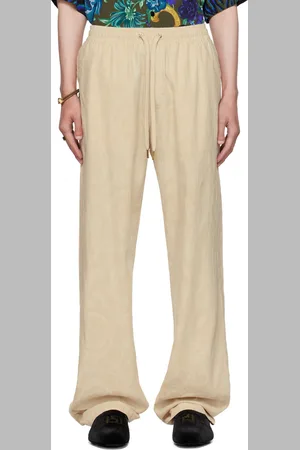 VERSACE Pantalon de détente blanc cassé à motif Barocco