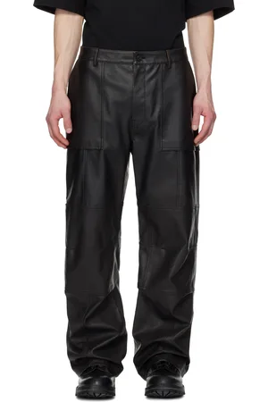 JUUN.J Pantalon noir en cuir synthétique à genoux à nervures