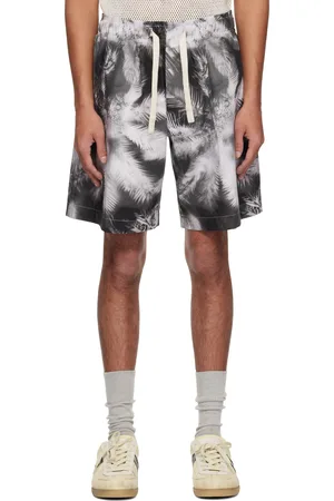 Palm Angels Short noir et blanc à motif de palmiers en négatif