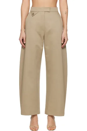 Recto Pantalon beige à taille haute et à jambes incurvées