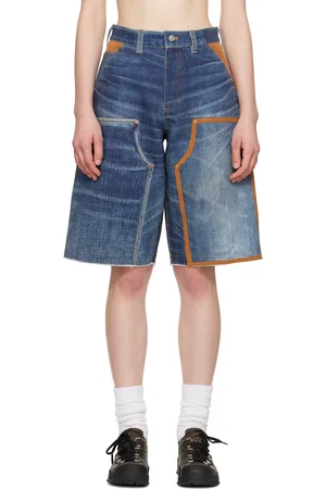 Andersson Bell Short bleu en denim à empiècements et à motif de denim trompe l