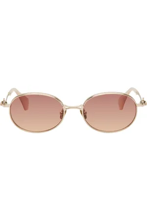 Vivienne Westwood Lunettes de soleil ovales dorées à orbes