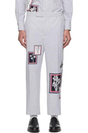 Thom Browne Pantalon bleu marine et blanc en tissu gaufré à images florales