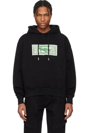 OFF-WHITE Pull à capuche de planchiste noir à quatre flèches et à image de billet