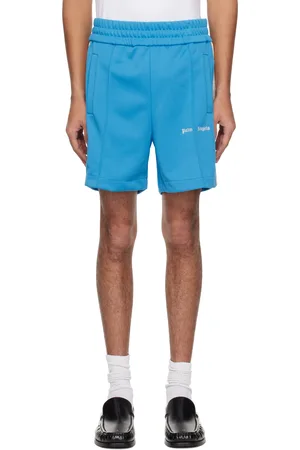 Palm Angels Short de survêtement bleu à logo