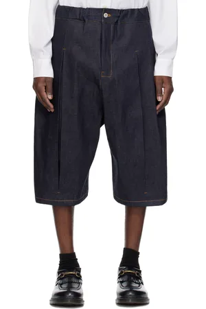 SAGE NATION Short bleu en denim à plis creux