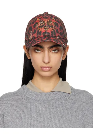 Ganni Casquette rouge et noir à motif léopard