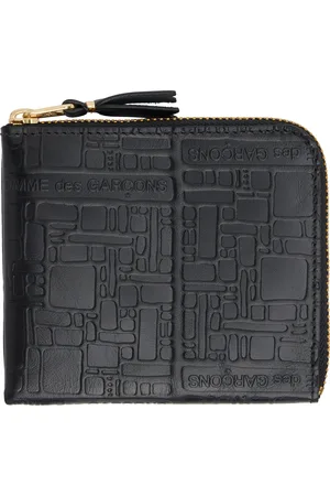 Comme des Garçons Portefeuille noir à motif à logos gaufré