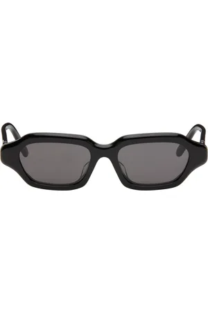 Loewe Lunettes de soleil noires à monture étroite et à logos
