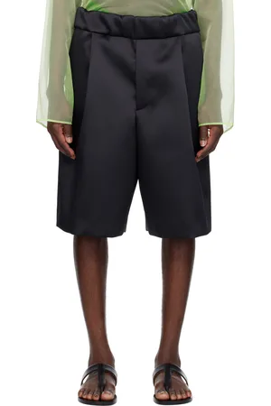 DRIES VAN NOTEN Short bleu marine en satin à plis