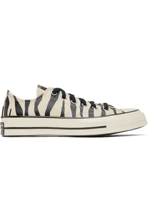 Converse Baskets basses Chuck 70 noir et blanc cassé à motif zébré phosphorescent