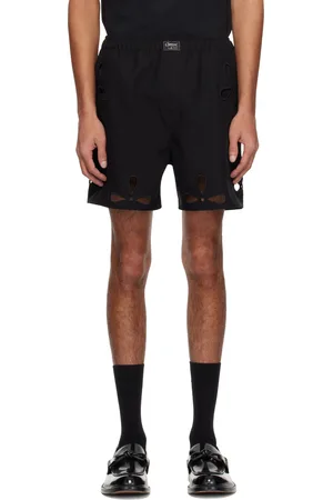 COPERNI Short noir à découpes de style pétale et à bords brodés