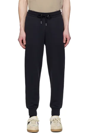 Moncler Pantalon de survêtement bleu marine en coton à garniture tricolore